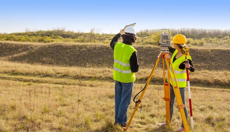Land Surveyors at Work
